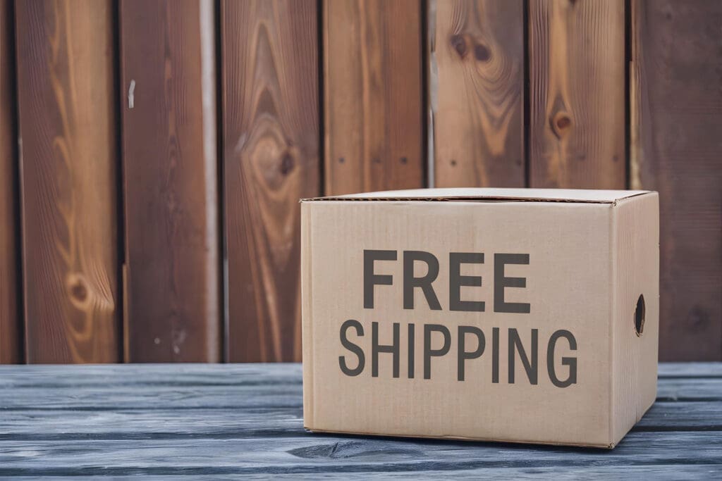 Free shipping box against a wooden background
