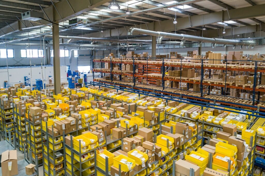A busy warehouse with items in the middle for picking