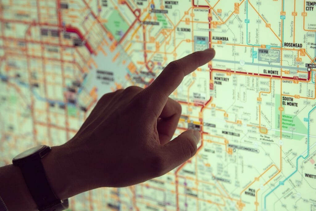 Hand on subway map