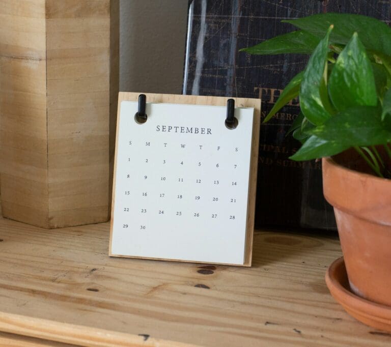 A calendar sitting on a desk